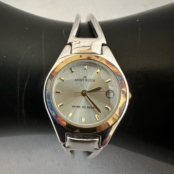Anne Klein Accessories - Anne Klein silver and gold tone bracelet style watch with date function